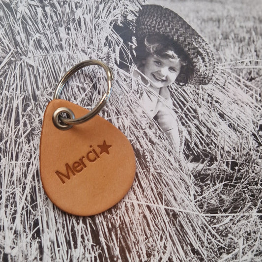 Porte clés goutte Merci