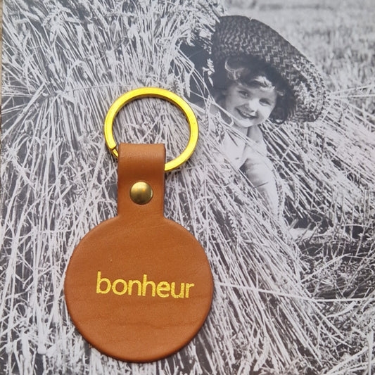 Porte clés rond cuir Bonheur